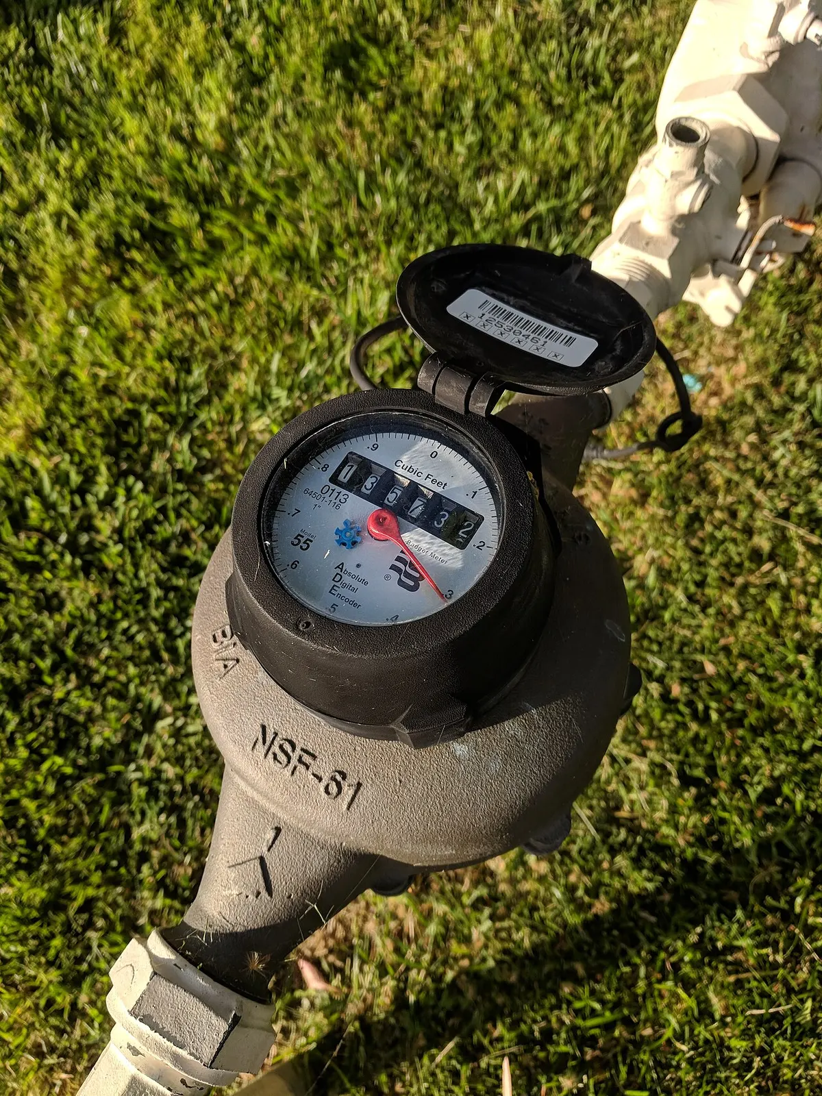 Natural gas meter that fuels a standby generator, mounted on the exterior of a North Shore home